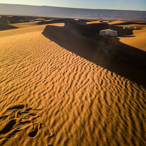 Dar Ahlam desert tents sunset
